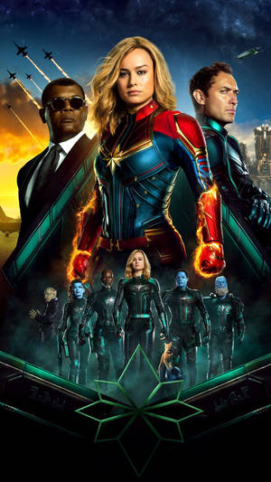Captain Marvel 和她的團隊穿著超級英雄服裝，在太空和城市背景下。 — 漫威標誌 壁紙