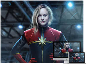 Captain Marvel 穿著她的超級英雄服裝，出現在電腦顯示器和筆記型電腦螢幕上。 — 驚奇隊長 壁紙