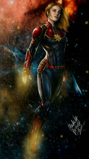 Captain Marvel 漂浮在色彩繽紛的星雲中，帶有發光的能量效果。 — 漫威復仇者聯盟 壁紙