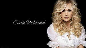 Carrie Underwood 身穿白色襯衫，金色捲髮，黑色背景。 — 凱莉·安德伍德 壁紙