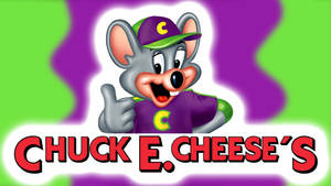 Chuck E. Cheese 吉祥物在紫色和綠色中豎起大拇指。 — 查克芝士 壁紙