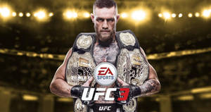 Conor McGregor 在明亮的場館中手持UFC冠軍腰帶。 — 終極格鬥冠軍賽 壁紙