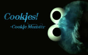 Cookie Monster 的大眼睛和毛茸茸的藍色臉部，文字寫著 Cookies — 餅乾怪獸 壁紙