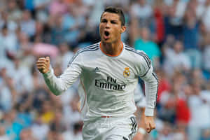 Cristiano Ronaldo 身穿白色皇家馬德里球衣慶祝進球。 — 克里斯蒂亞諾·羅納度 壁紙