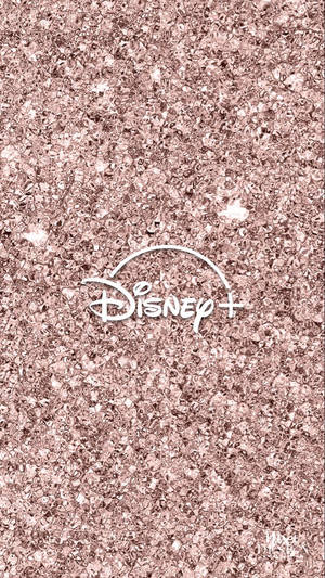 玫瑰金色閃粉背景上的 Disney+ 標誌 — 迪士尼桌布 壁紙