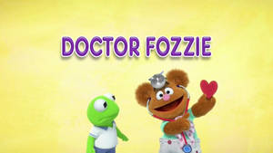 Doctor Fozzie Bear 手持一個紅色心形，旁邊有 Kermit the Frog。 — 可愛熊 壁紙