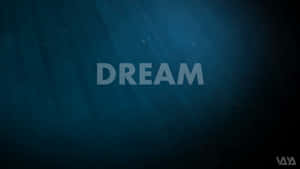 「DREAM」這個字在帶有光線和粒子的深藍色水中漂浮。 — 夢幻 GIF 壁紙