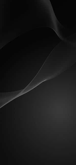 深色背景上抽象的黑灰流動曲線。 — 悟空黑 iPhone 壁紙
