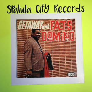 復古 Fats Domino 專輯封面裱框在萊姆綠色背景上。 — 音樂 壁紙