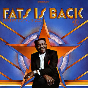Fats Domino 身穿燕尾服，出現在帶有星爆設計的復古專輯封面上。 — 音樂 壁紙