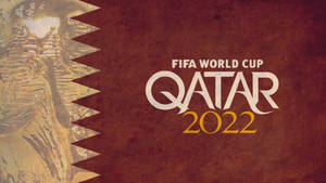 FIFA World Cup Qatar 2022 官方標誌，栗色和金色設計元素。 — 卡達 壁紙