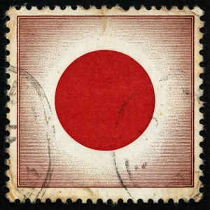 帶有紅色圓圈和郵戳的復古日本郵票
