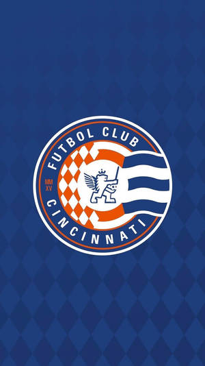 Futbol Club Cincinnati 足球隊標誌在藍色菱形背景上。 — 運動 壁紙