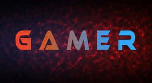 在火紅背景上以漸變色彩顯示的Gamer文字，並帶有發光粒子。 — 玩家 壁紙