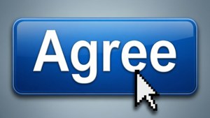 一個帶有 'Agree' 標籤的藍色數位按鈕，滑鼠游標指向它。