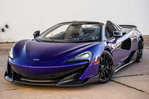 紫色McLaren 570S Spider敞篷跑車停在混凝土上。 — Surface 壁紙