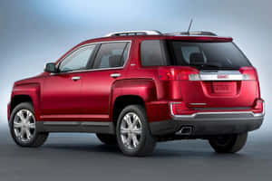 在工作室環境中從後方四分之三角度觀看的紅色GMC Terrain SUV。 — 凱迪拉克 壁紙