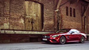 紅色賓士AMG SL63停放在磚倉庫前。 — Mercedes Benz C300 壁紙