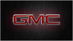 GMC 標誌，紅色鍍鉻字母，拉絲金屬背景