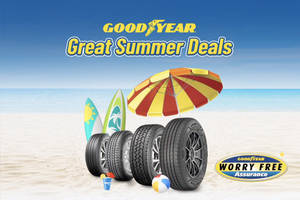 海灘上的 Goodyear 輪胎，配有衝浪板和傘，夏季優惠。 — 品牌 壁紙