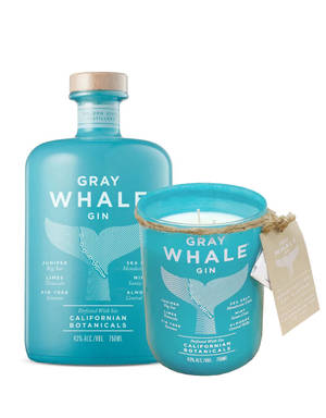 Gray Whale Gin 酒瓶和蠟燭，帶有鯨魚尾巴設計和植物成分。 — 高清 壁紙