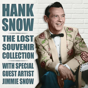 Hank Snow 穿著玫瑰刺繡西裝，在復古文字旁微笑。 — 雪人 壁紙