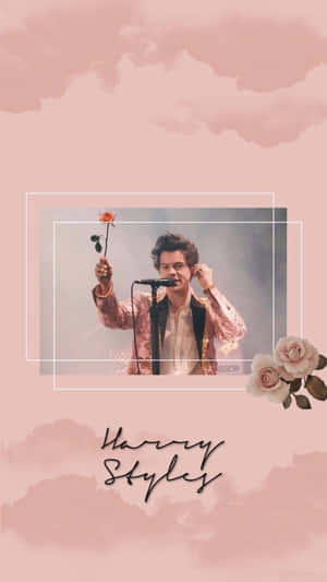 Harry Styles 在粉紅色水彩背景前手持玫瑰對著麥克風唱歌。 — 哈利·史泰爾斯 GIF 壁紙