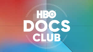HBO Docs Club 標誌以粗體白色文字顯示在彩色漸變背景上。 — iMac 壁紙