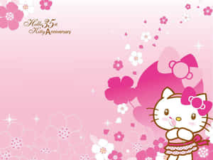 Hello Kitty 在粉紅花卉慶典中帶有週年文字 — 凱蒂貓 美學 GIF 壁紙