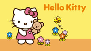 Hello Kitty 抱著泰迪熊，與花朵和蝴蝶在黃色背景上。 — Hello Kitty 萬聖節 壁紙