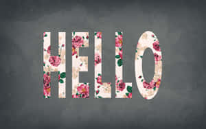 「hello」這個字是用粉紅色玫瑰和綠色葉子在灰色背景上製成。 — 氣球 壁紙