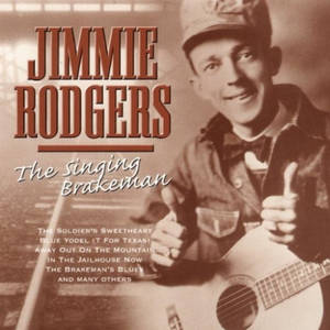 Jimmie Rodgers 在棕褐色調肖像中抱著吉他並豎起大拇指。 — 專輯封面 壁紙