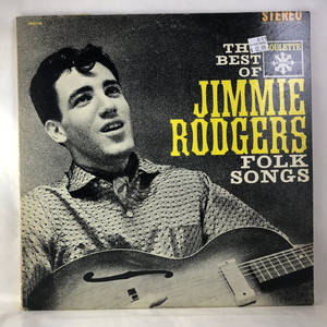 專輯封面 featuring Jimmie Rodgers 手持吉他，帶有粗體黃色文字。 — 專輯封面 壁紙
