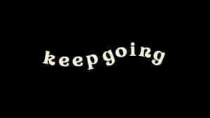 黑色背景上的奶油色勵志文字 keep going。 — 簡約暗黑美學 壁紙