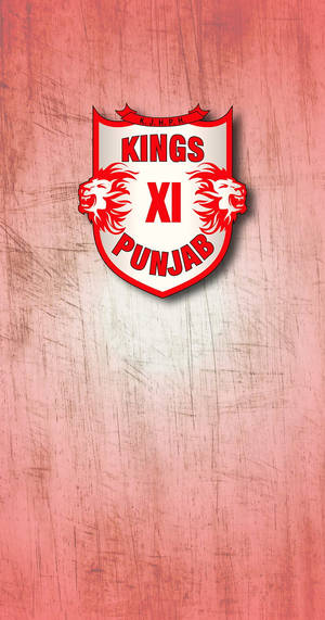 Kings XI Punjab 板球隊標誌在粉紅色刮痕背景上。 — 東方龍 壁紙