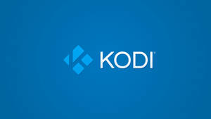 藍色背景上的 Kodi 媒體播放器標誌 — 科迪 壁紙