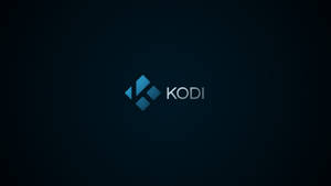 深藍色漸變背景上的 Kodi 媒體播放器標誌 — The Krew 壁紙