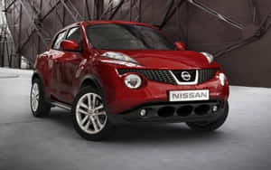 現代工業工作室中的紅色日產Juke SUV。 — 日產 壁紙