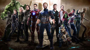 Marvel 超級英雄團隊在岩石地形中擺出戰鬥姿勢。 — 漫威復仇者聯盟 壁紙