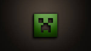 深色背景上的綠色 Minecraft 爬行者面孔標誌 — 我的世界迷因 壁紙