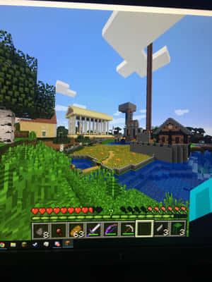 Minecraft 遊戲視圖，具有像素化景觀和使用者介面。 — iPad Pro 13 壁紙