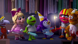 Muppet 角色穿著戲服在後台用煙火慶祝。 — 妙妙熊仔 壁紙