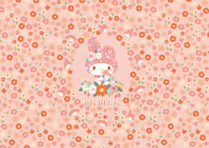 My Melody 在花卉圖案背景中手持花朵。 — 粉紅色美學桌面 壁紙