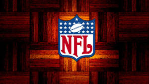 NFL 標誌在木質拼花地板背景上，帶有溫暖照明。 — NFL 美式足球 壁紙
