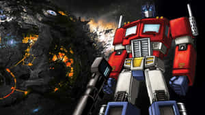 Optimus Prime 機器人站在充滿熔岩和瓦礫的熾熱戰鬥場景中。 — 動畫卡通 壁紙