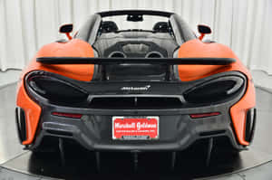 橙色McLaren 600LT Spider敞篷跑車工作室後視圖 — Surface Laptop 壁紙