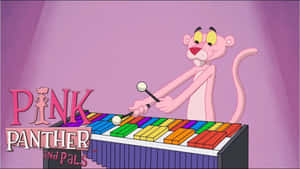 Pink Panther 在卡通場景中演奏彩虹木琴。 — 搞笑猴子 壁紙