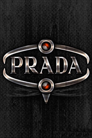 Prada 標誌，帶有銀色徽章和紅色寶石，位於黑色皮革紋理上。 — 普拉巴斯 壁紙
