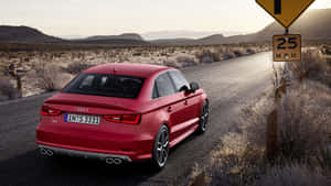 紅色Audi S3轎車在沙漠公路上，有25 M.P.H.速度限制標誌。 — 奧迪 GIF 壁紙