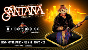 Santana 在 House of Blues Las Vegas 現場演出，背景是霓虹城市。 — 音樂 壁紙